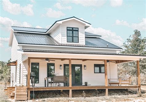 modern farmhouse with metal roof